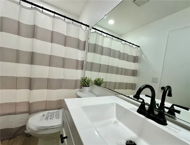 a bathroom with a sink and a bathtub