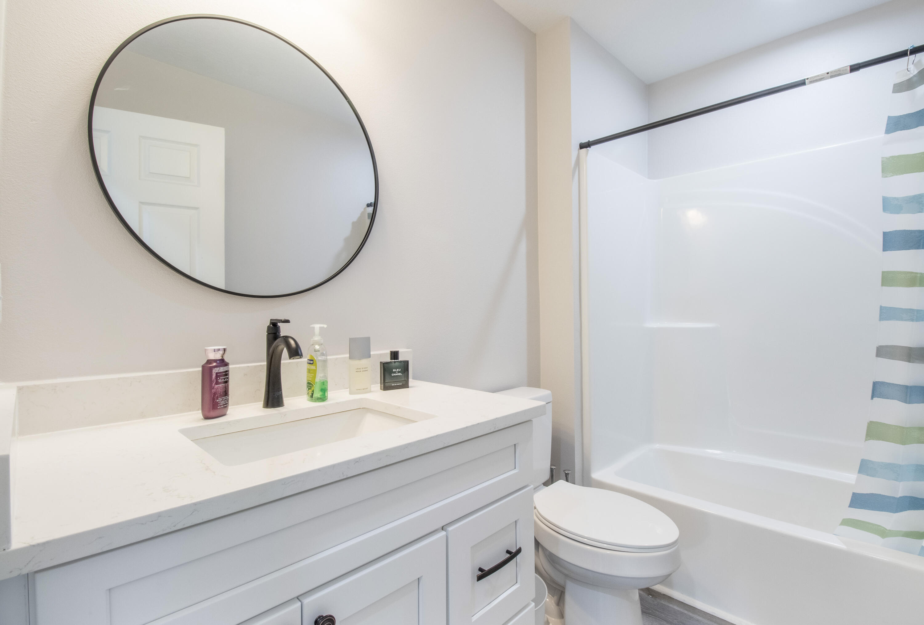 5374 Highview Drive Crestview, FL 32539 - Photo 12 of 12 a bathroom with a sink a toilet and a mirror