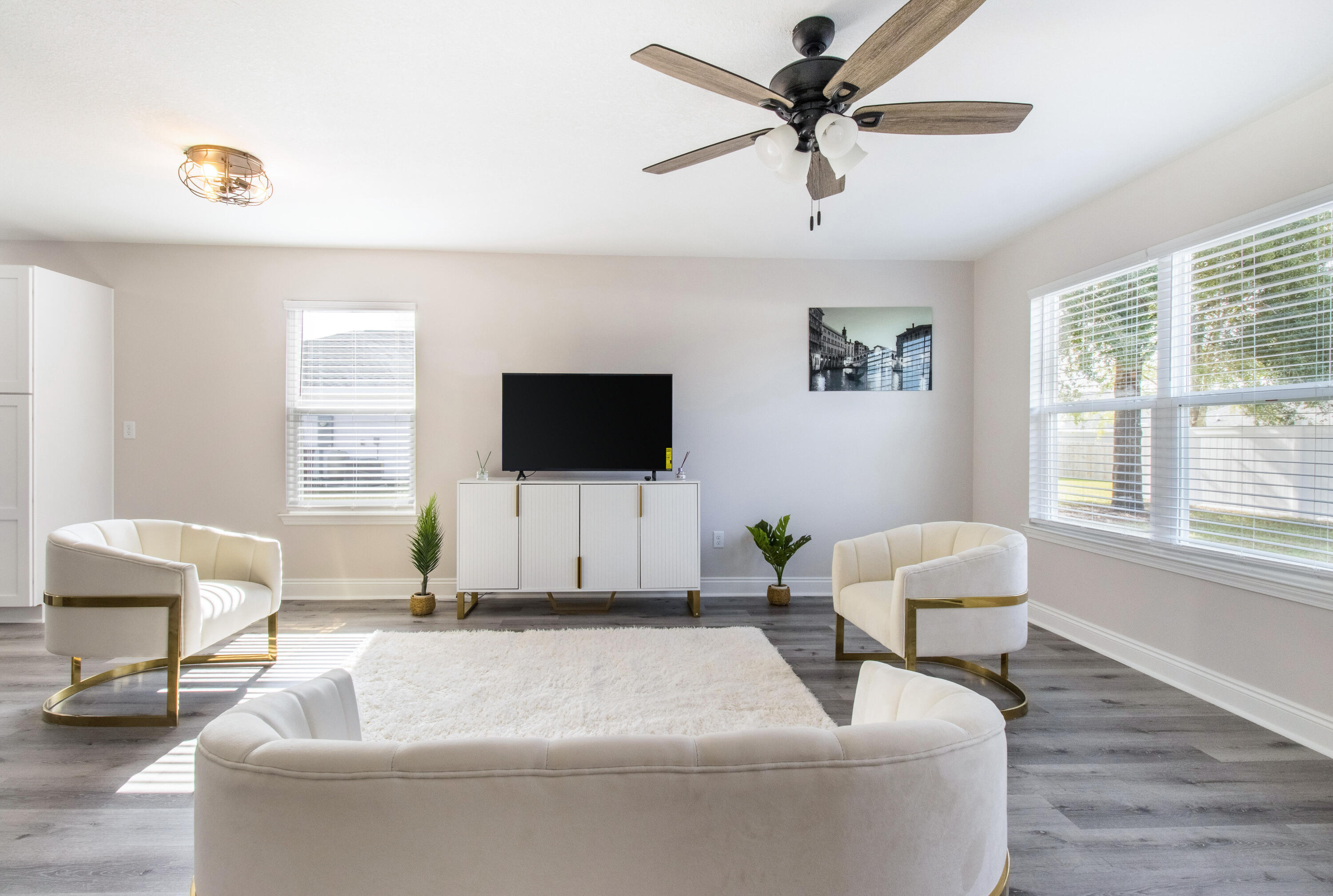 5374 Highview Drive Crestview, FL 32539 - Photo 6 of 12 a living room with furniture and a flat screen tv