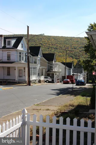 a view of a brick house with a window