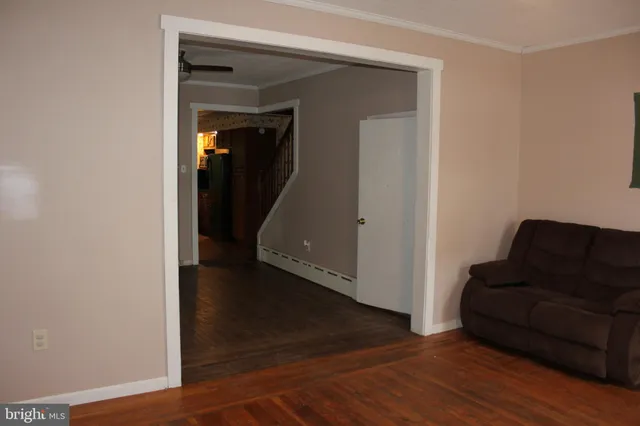 a bathroom with a sink toilet and mirror