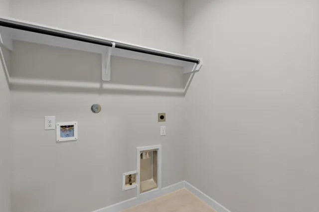 front view of a house with a small yard