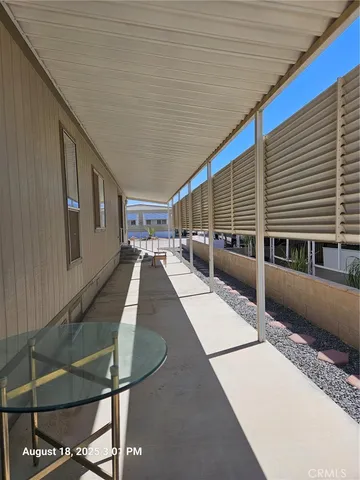 a view of a porch with furniture