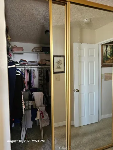 a bathroom with a bathtub and a window
