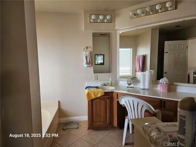 a bedroom with a bed and furniture