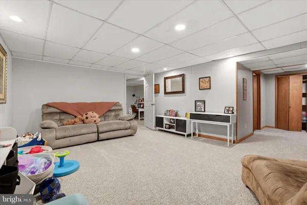 a bedroom with furniture and a couch