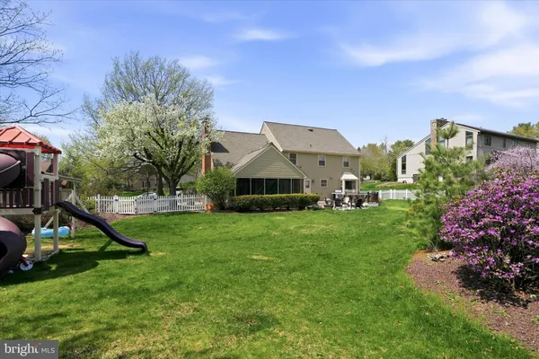 a view of a house with a park