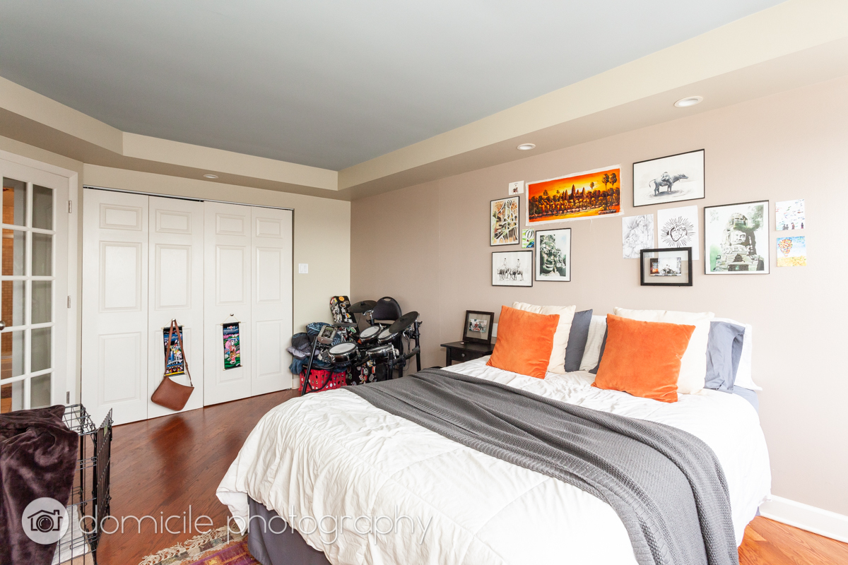 655 West Irving Park Road, Unit 3103 Chicago, IL 60613 - Photo 13 of 18 a bedroom with bed and a closet