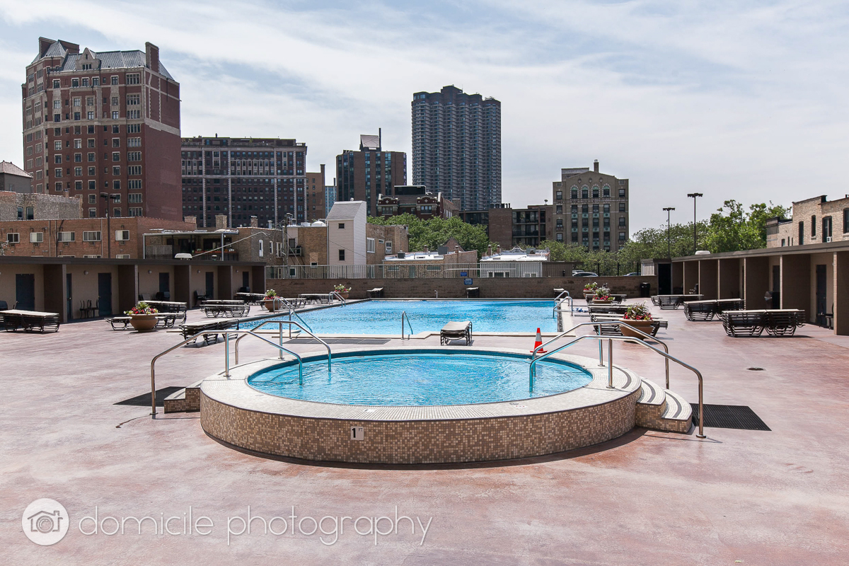 655 West Irving Park Road, Unit 3103 Chicago, IL 60613 - Photo 17 of 18 a view of a swimming pool with chairs