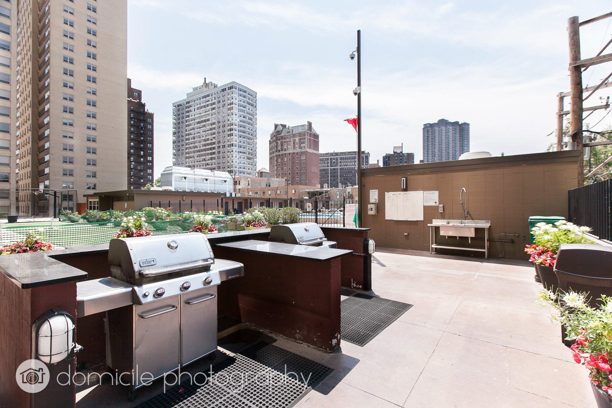 655 West Irving Park Road, Unit 3103 Chicago, IL 60613 - Photo 18 of 18 a view of roof deck with furniture