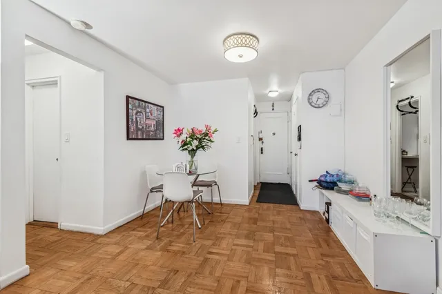 a room with furniture and a flat screen tv