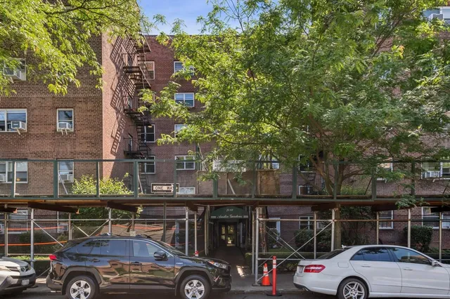 a view of cars parked on a street