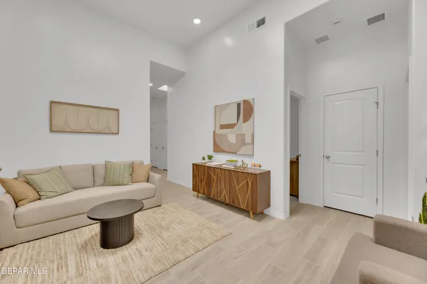 a living room with furniture and a couch