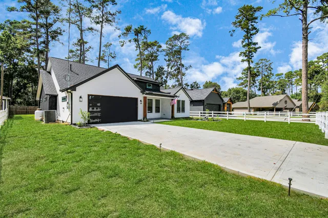 a house with garden in front of it
