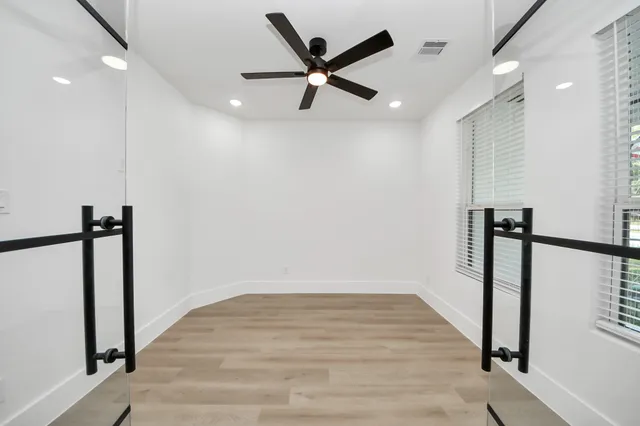 a bathroom with a sink and shower