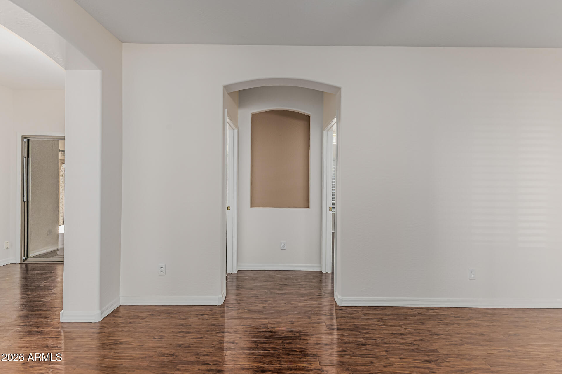 1650 South Crismon Road, Unit 16 Mesa, AZ 85209 - Photo 11 of 39 a view of a hallway with wooden floor