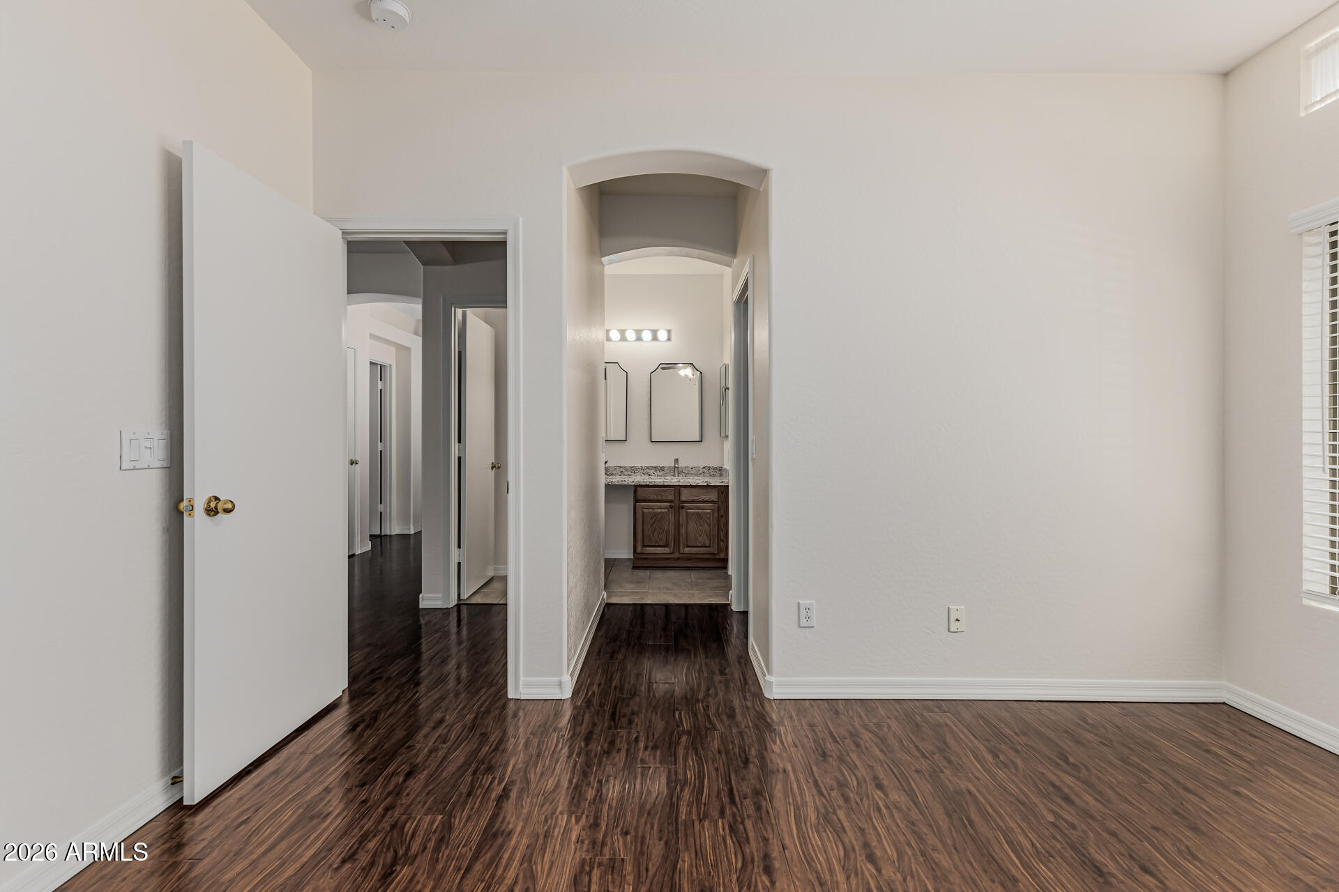 1650 South Crismon Road, Unit 16 Mesa, AZ 85209 - Photo 25 of 39 wooden floor in a gallery