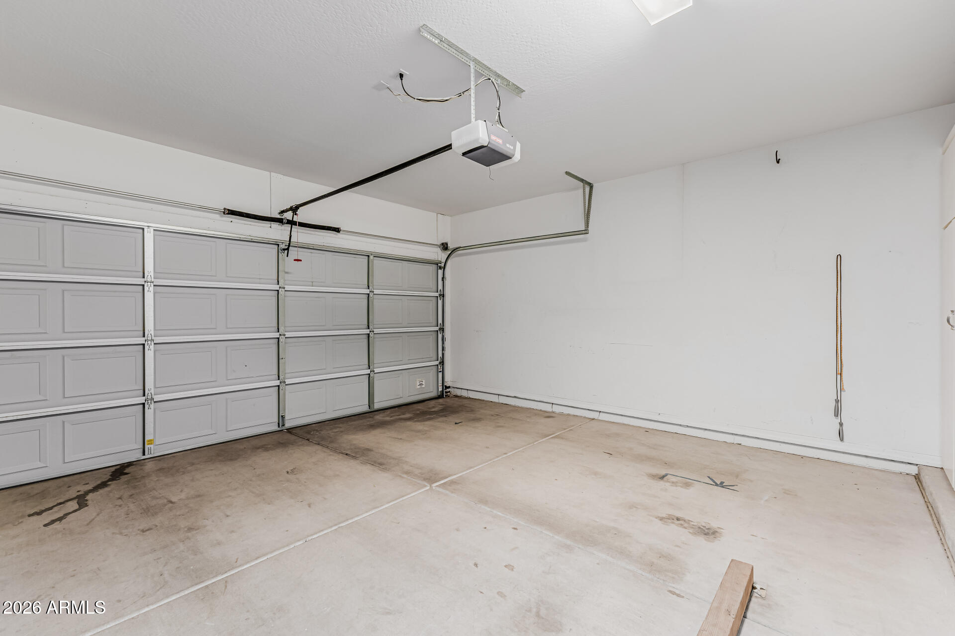 1650 South Crismon Road, Unit 16 Mesa, AZ 85209 - Photo 30 of 39 a view of a garage