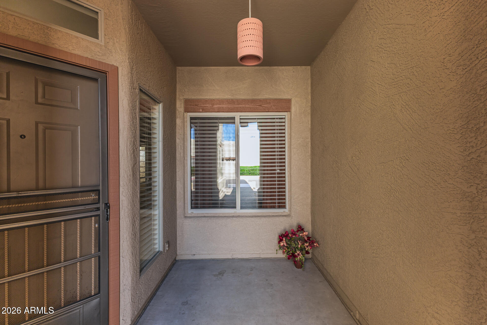 1650 South Crismon Road, Unit 16 Mesa, AZ 85209 - Photo 6 of 39 a view of a livingroom with couch