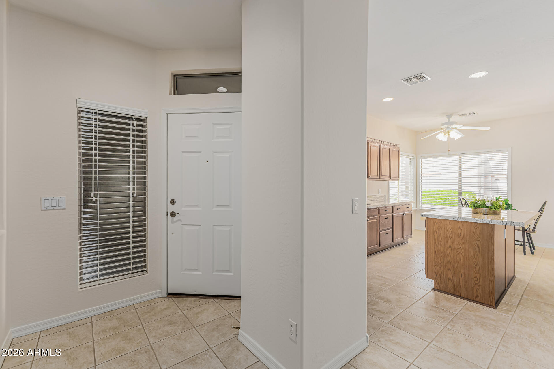 1650 South Crismon Road, Unit 16 Mesa, AZ 85209 - Photo 7 of 39 a view of kitchen with furniture and large window