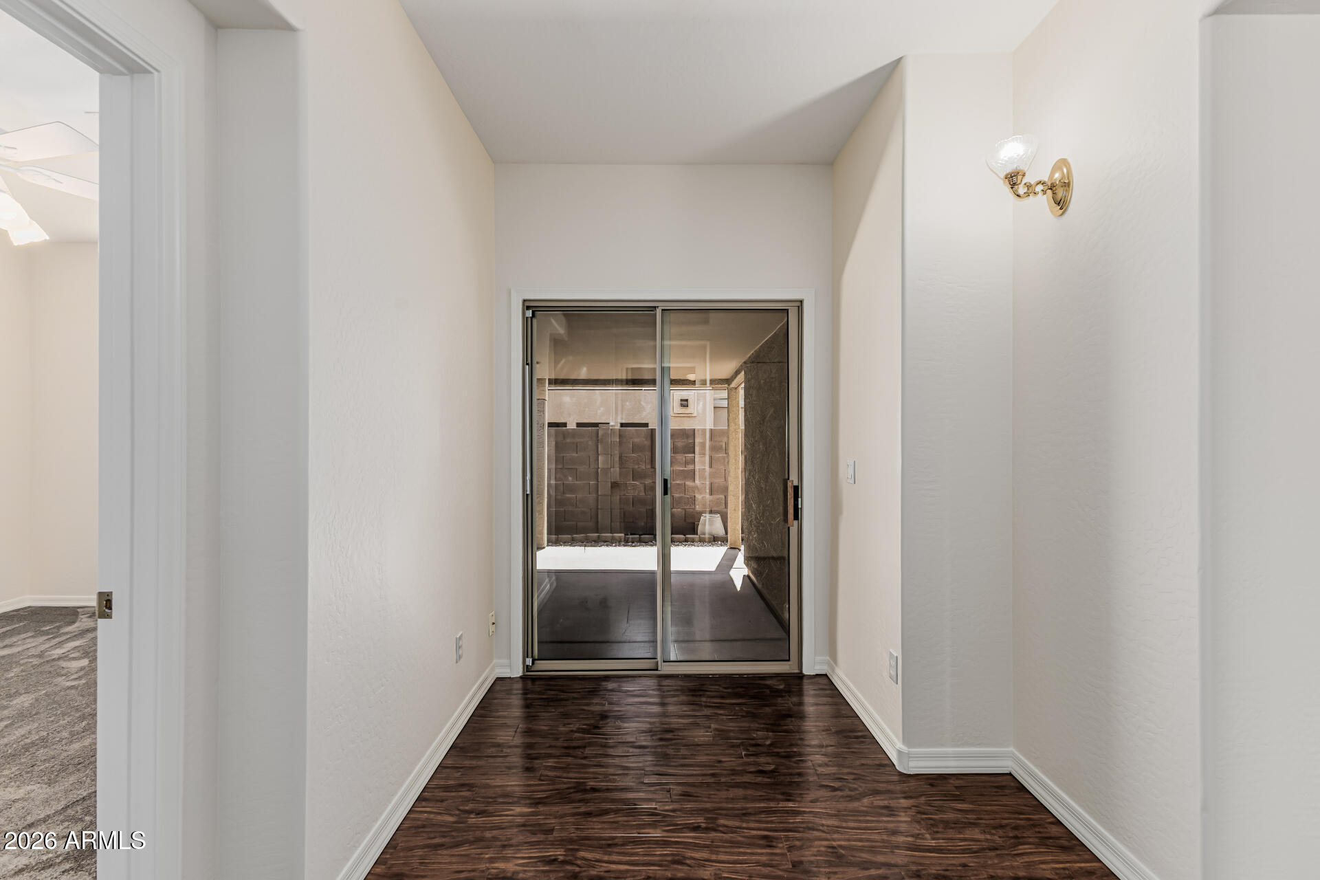 1650 South Crismon Road, Unit 16 Mesa, AZ 85209 - Photo 9 of 39 a view of a hallway
