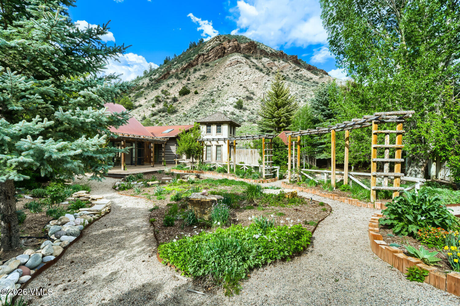 1644 Squaw Creek Road Edwards, CO 81632 - Photo 4 of 21 a view of a house with a yard and pathway