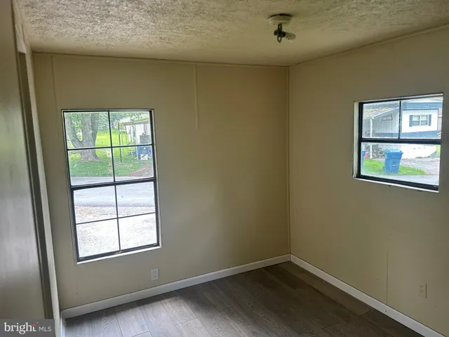 a view of small space with wooden floor