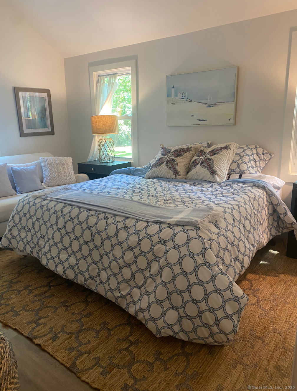 101 Cow Hill Road Clinton, CT 06413 - Photo 12 of 24 a bedroom with a bed and a window