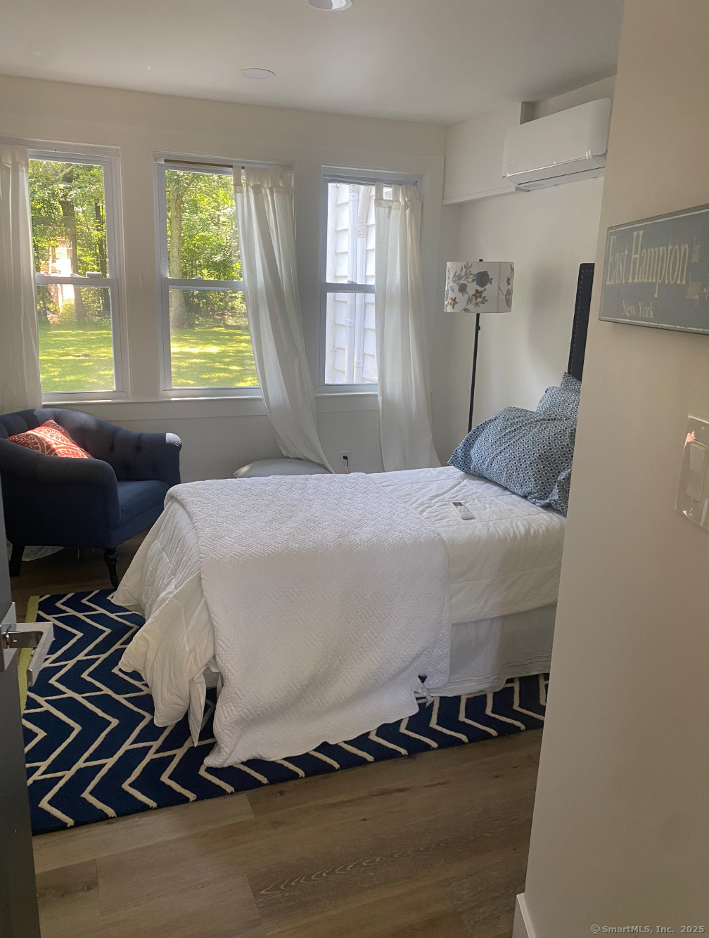 101 Cow Hill Road Clinton, CT 06413 - Photo 16 of 24 a bedroom with a bed and a window