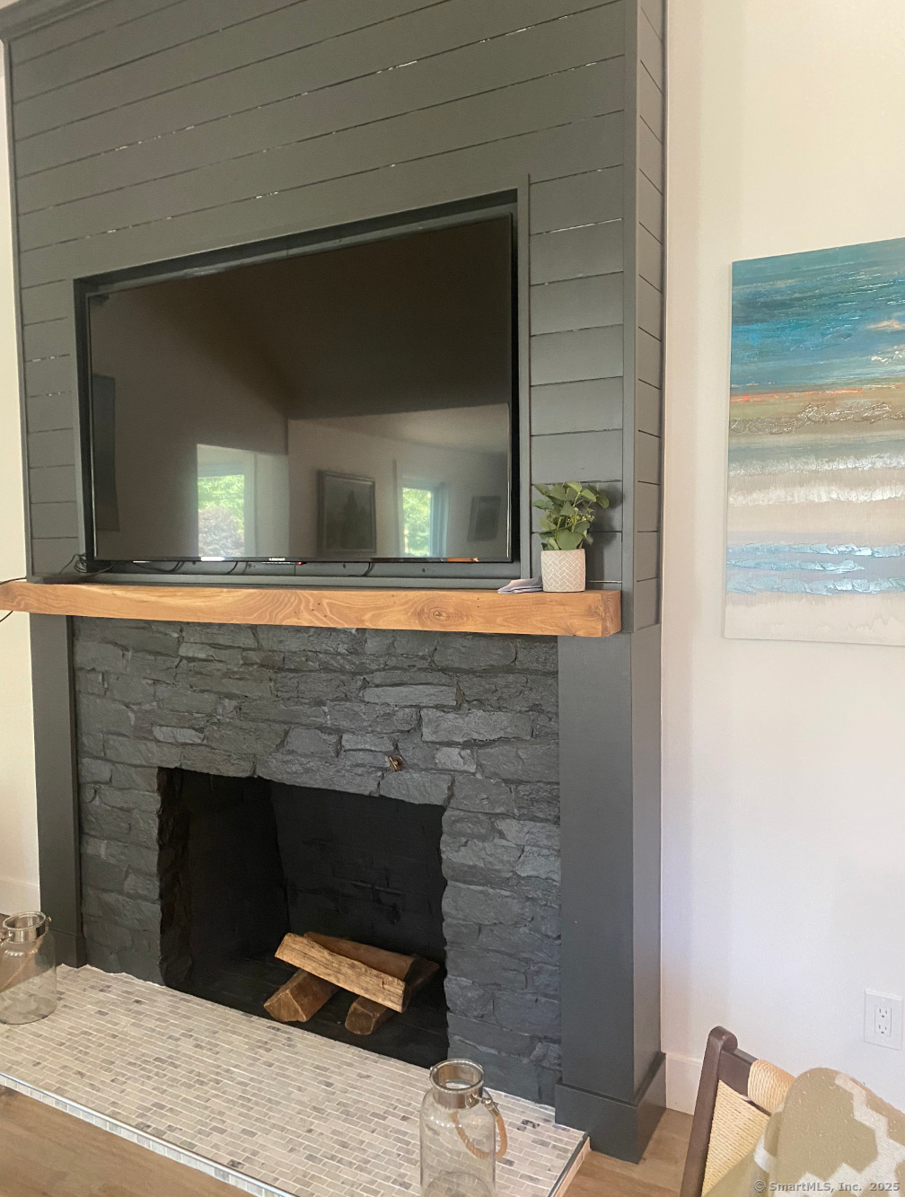 101 Cow Hill Road Clinton, CT 06413 - Photo 4 of 24 a brick house with a fireplace in it