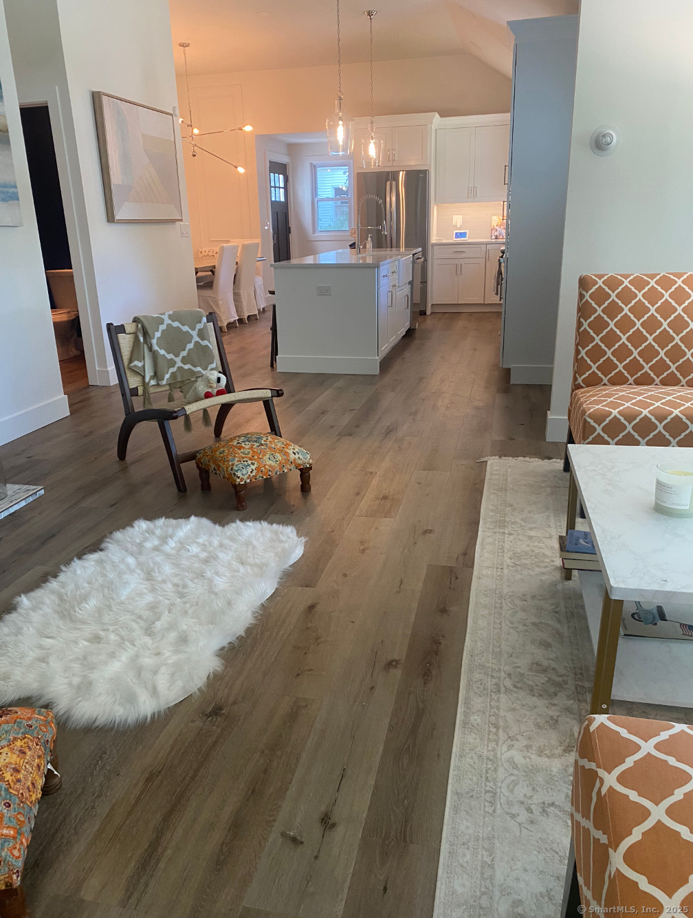 101 Cow Hill Road Clinton, CT 06413 - Photo 5 of 24 a living room with furniture and a wooden floor