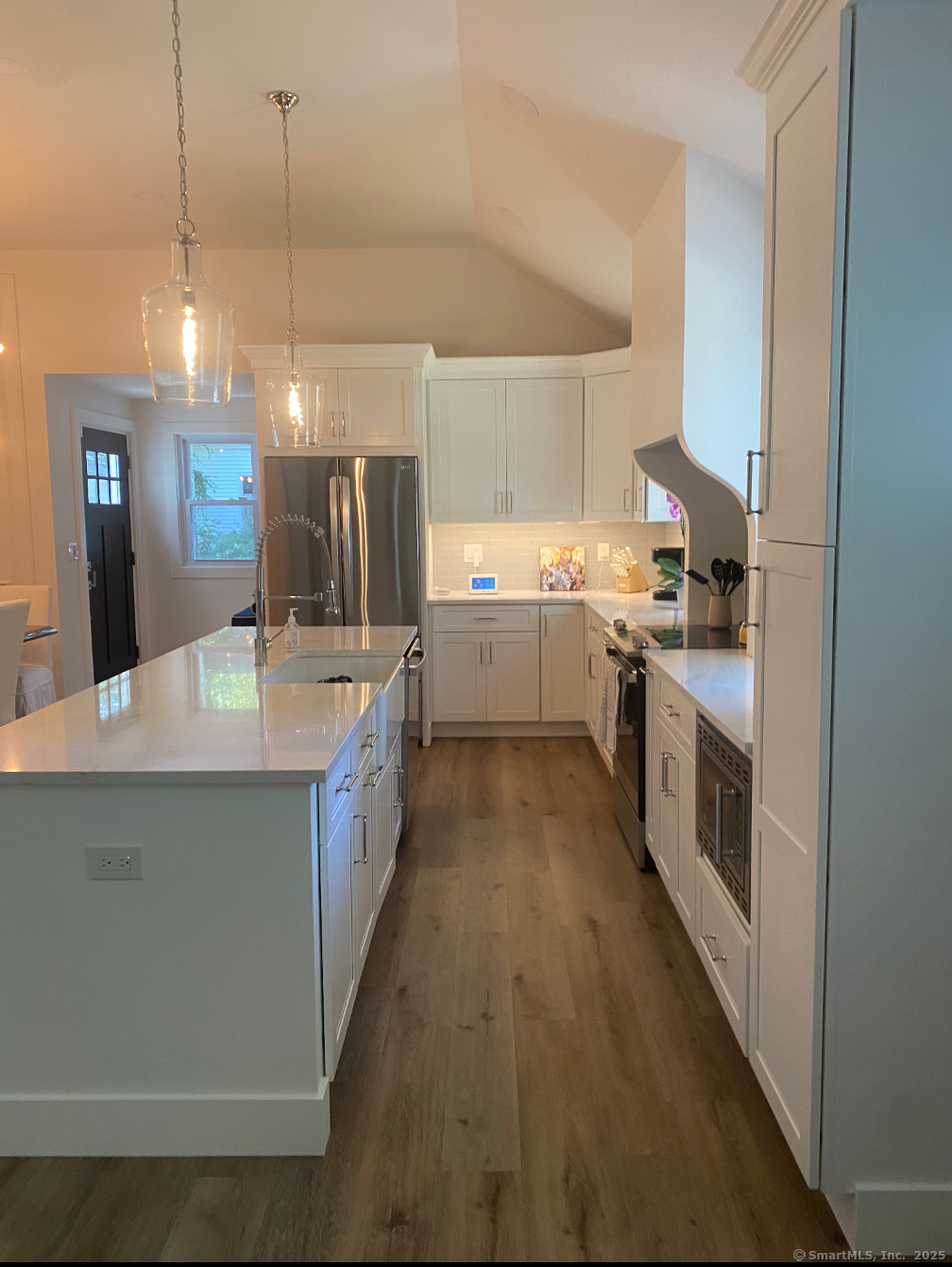 101 Cow Hill Road Clinton, CT 06413 - Photo 6 of 24 a large kitchen with a stove top oven