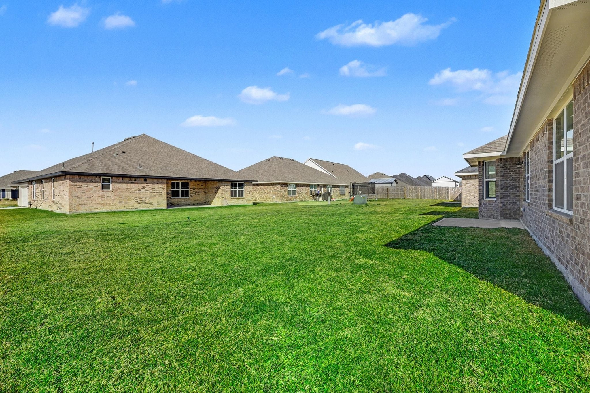 1 Keystone Court Angleton, TX 77515 - Photo 26 of 26 a view of a big house with a big yard and large trees
