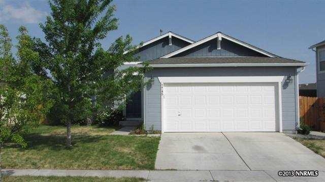 7745 Tulear Street Reno, NV 89506 - Photo 1 of 1 a front view of a house with a yard