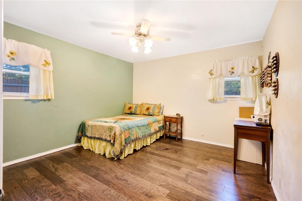 840 South Ridgeway Drive Cleburne, TX 76033 - Photo 18 of 25 Bedroom with wood finished floors and a ceiling fan