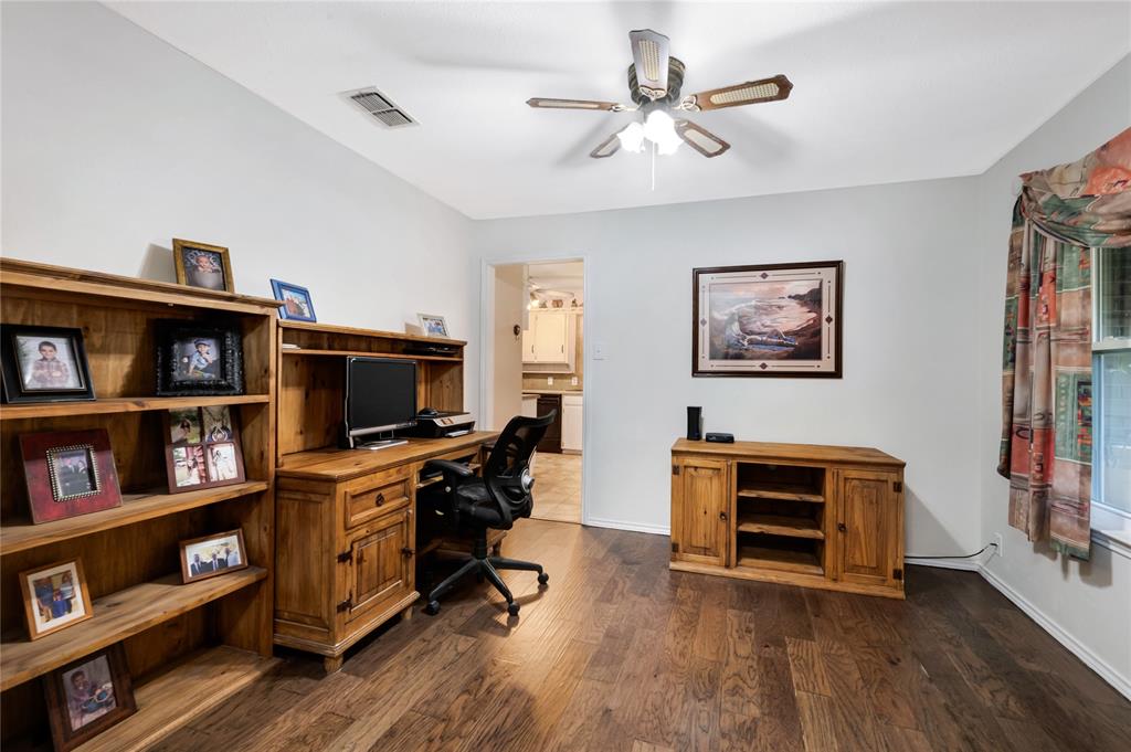 840 South Ridgeway Drive Cleburne, TX 76033 - Photo 22 of 25 Office featuring dark wood-style flooring and ceiling fan