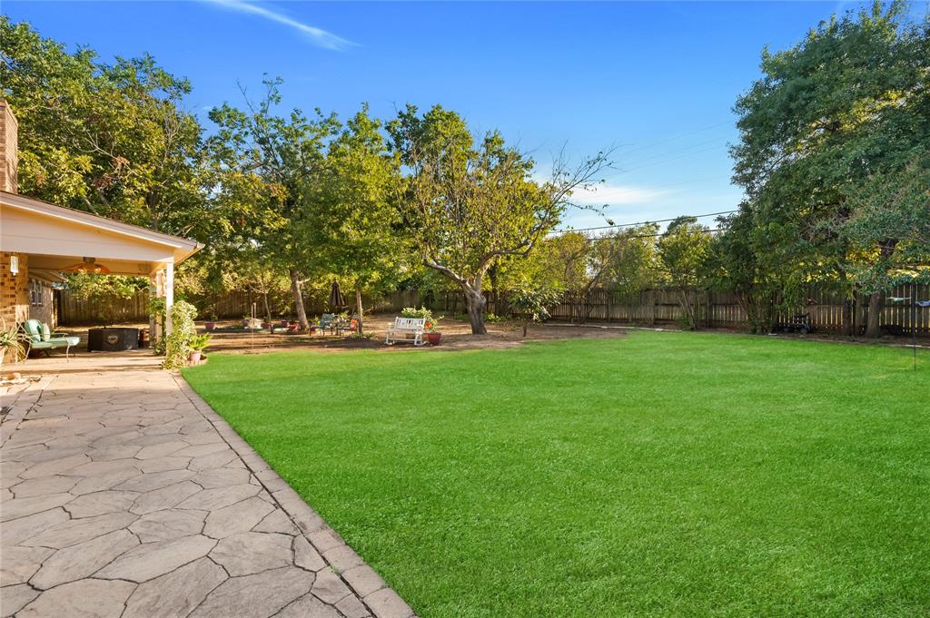 840 South Ridgeway Drive Cleburne, TX 76033 - Photo 24 of 25 Fenced backyard with a patio