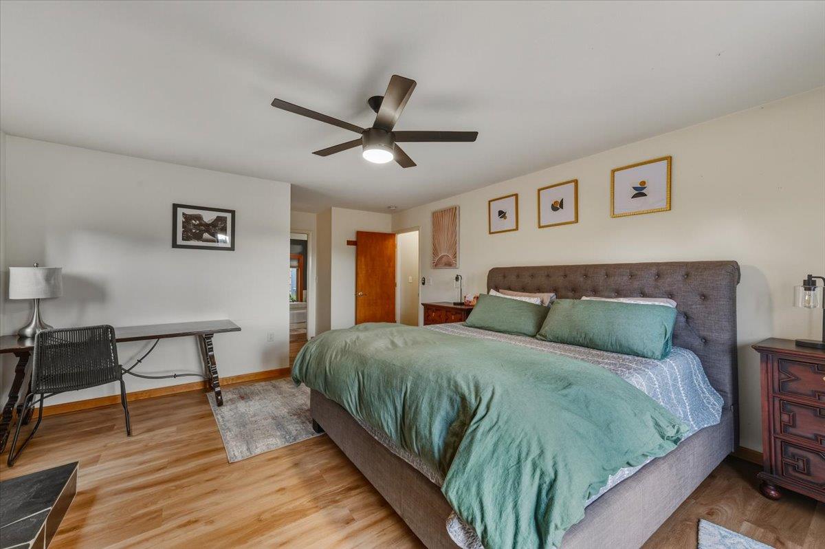 14752 Little Greenhorn Road Grass Valley, CA 95945 - Photo 13 of 35 a bedroom with a bed a table and chair