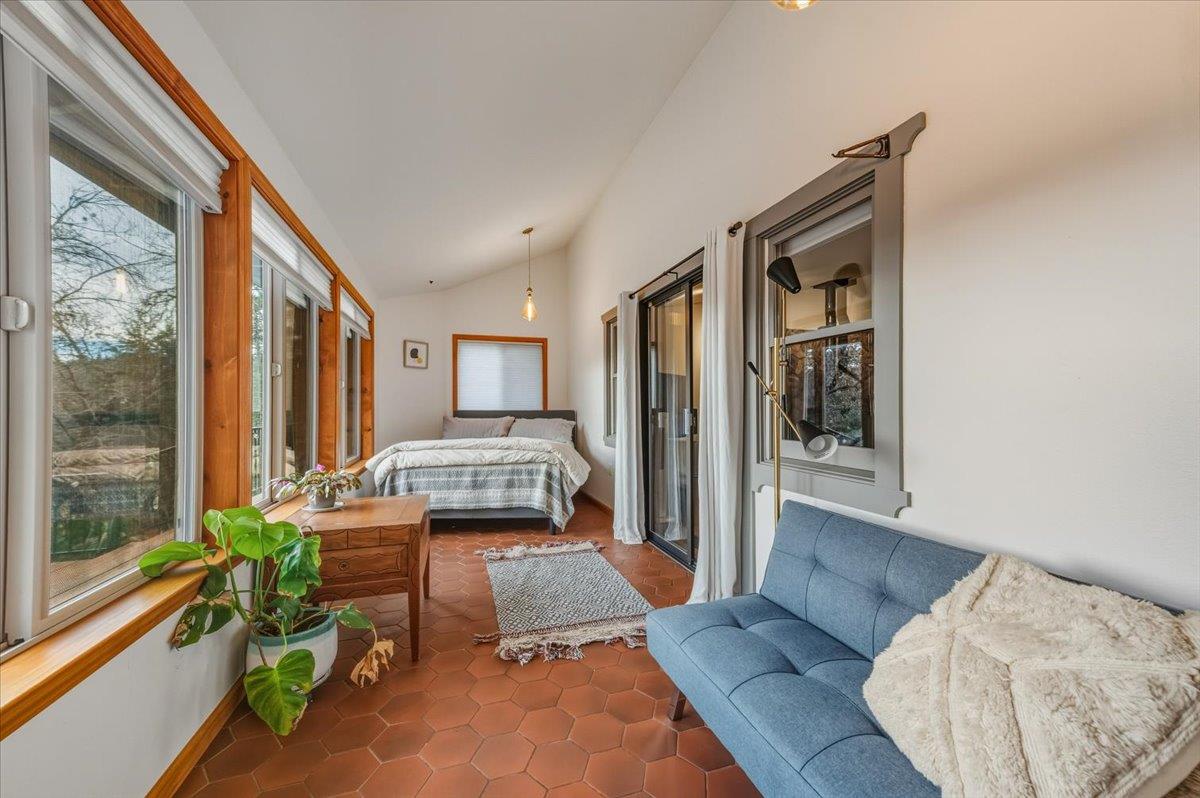 14752 Little Greenhorn Road Grass Valley, CA 95945 - Photo 19 of 35 a living room with furniture and a large window