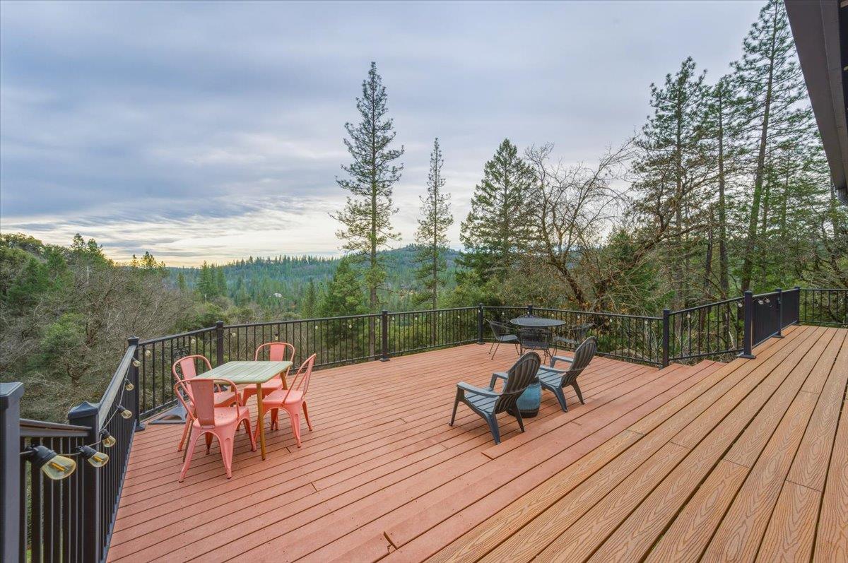 14752 Little Greenhorn Road Grass Valley, CA 95945 - Photo 26 of 35 a view of a roof deck with couches and wooden floor