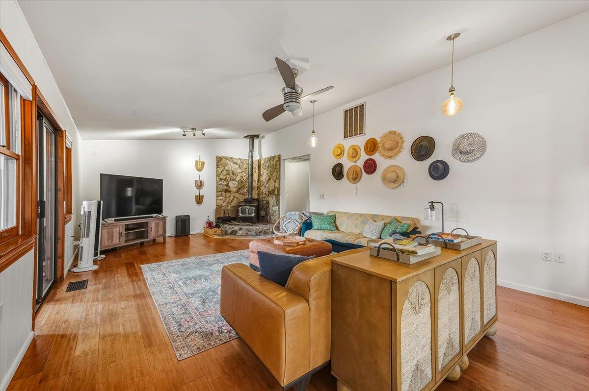 14752 Little Greenhorn Road Grass Valley, CA 95945 - Photo 5 of 35 a living room with furniture and flat screen tv
