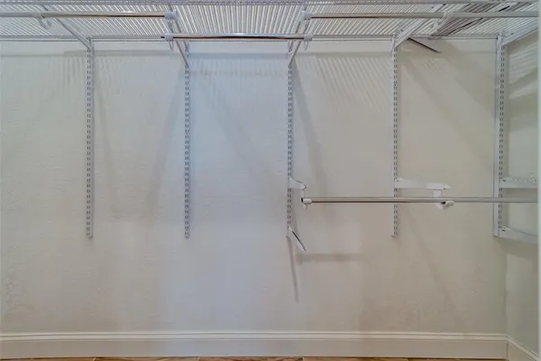 an aerial view of a house with outdoor space and street view