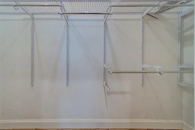 an aerial view of a house with outdoor space and street view