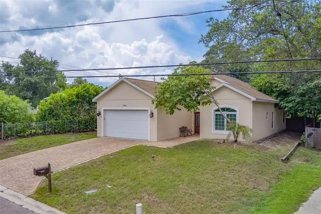 a kitchen with stainless steel appliances a refrigerator and a stove top oven