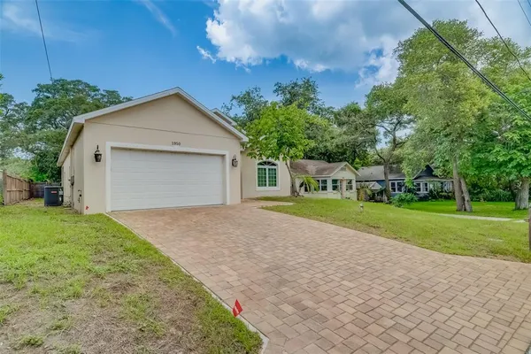 a house with trees in the background