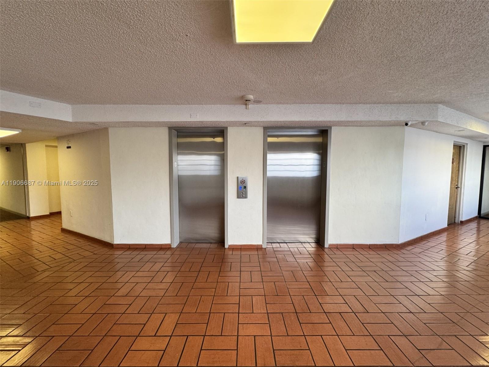 5800 Southwest 127th Avenue, Unit 2307 Miami, FL 33183 - Photo 3 of 23 a view of an empty room and window