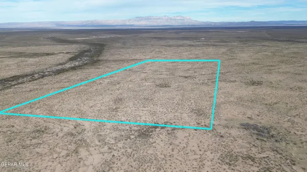 a view of a room with an empty space