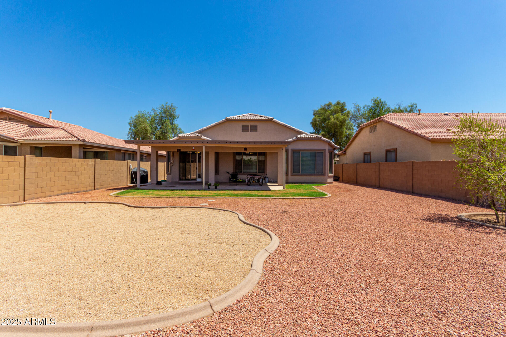 2413 West Beverly Rd. Phoenix, AZ 85041 - Photo 27 of 28 a front view of a house with a yard