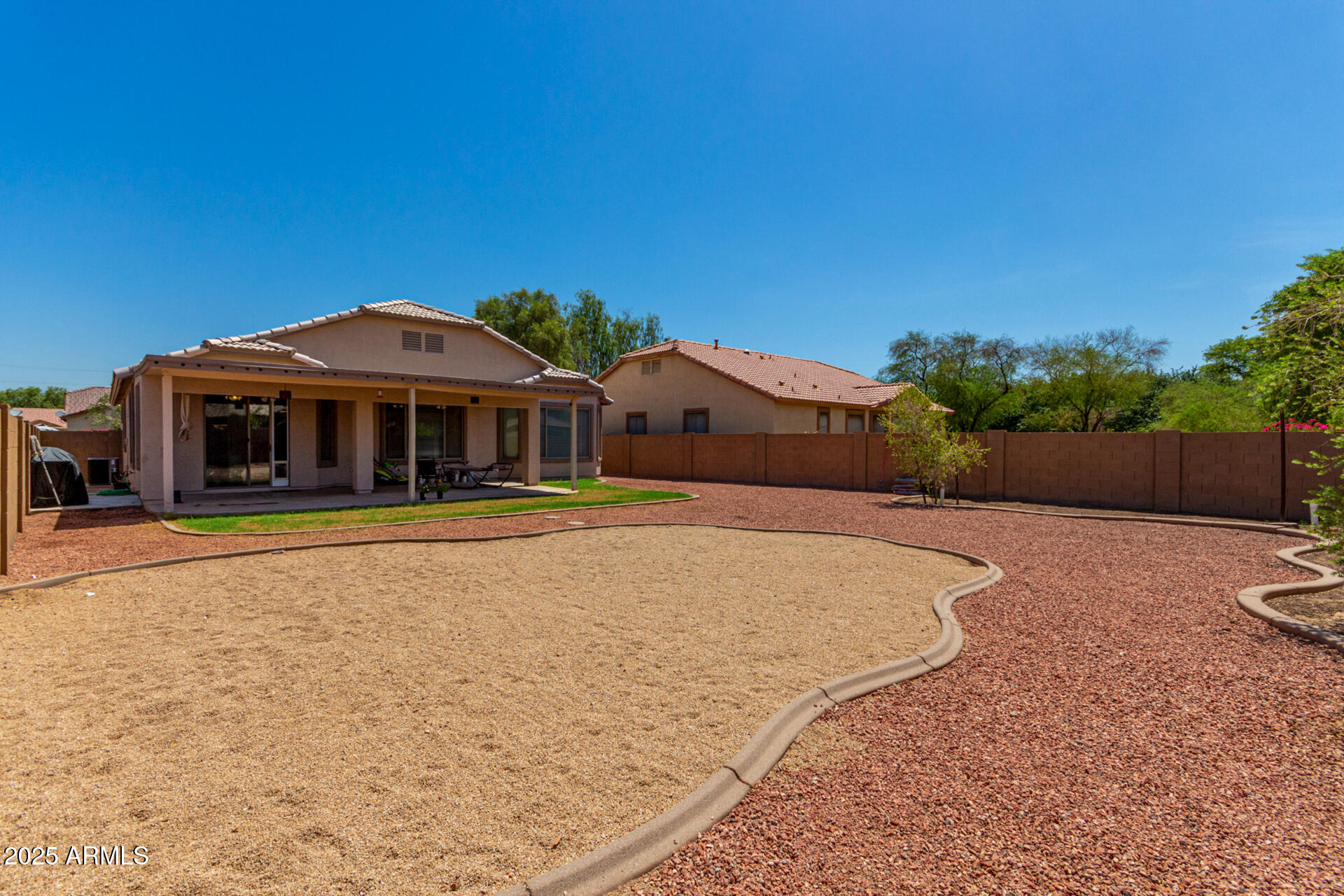 2413 West Beverly Rd. Phoenix, AZ 85041 - Photo 28 of 28 a front view of a house with a yard