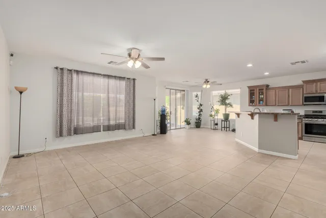 a view of a kitchen with a sink and a window
